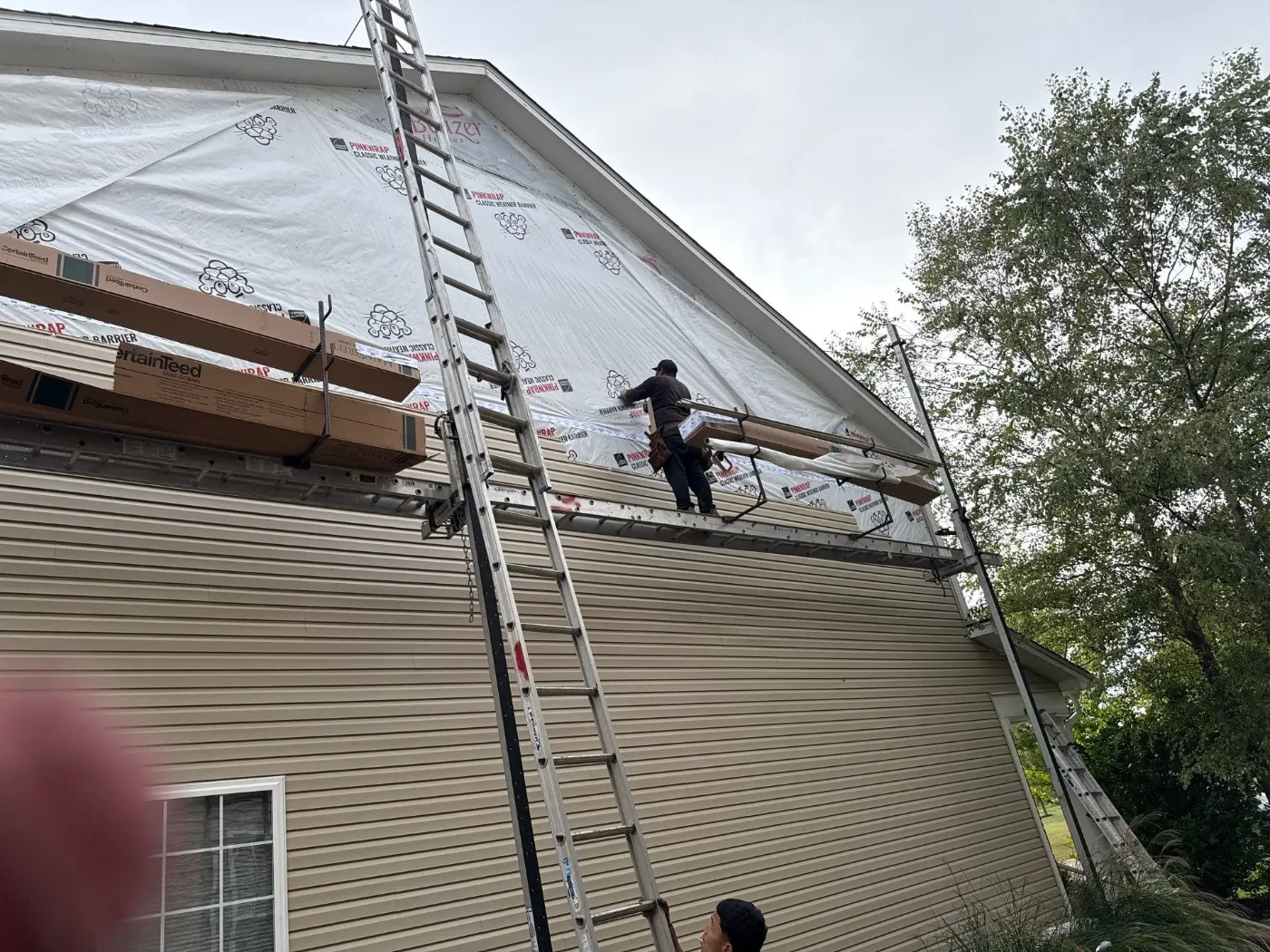 Storm-damaged siding documented in Zionsville